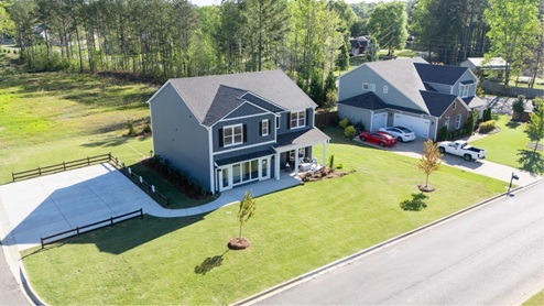 Welcome to Doss Ferry by D.R. Horton, in Kimberly, Alabama. Ideally located in northeast Jefferson County minutes from I-65. This new home community provides easy access to Hayden, Mount Olive, Gardendale’s conveniences, nearby Fultondale dining options, and excellent recreation spots throughout the area. Go Mortimer Jordan Blue Devils! With home plans ranging in size from 1,618 square feet up to 2,511 square feet, Doss Ferry offers a variety of home plans including one level open floor plans to a spacious two story. Each home in Doss Ferry is uniquely designed with modern living in mind, featuring granite countertops, elegant and durable flooring, and stainless-steel appliances. The easy-to-use Smart Home Technology Package included in every home provides the ultimate convenience, allowing you to control key features with the touch of a button. Featured conveniences include lighting automation, IQ panel, video doorbell, keyless front door entry, and temperature control from the ease of your phone. Doss Ferry is a unique living experience. Our community offers a spacious community pool, residents club, meandering walking trails with room to explore. Whether you are looking for a spacious open floor plan or a more intimate design, Doss Ferry has a variety of options to suit your individual needs. Doss Ferry’s location is perfect for accessing spots for hiking and biking adventures. In addition, state-of-the-art local parks and recreational opportunities are just minutes away, offering something for everyone. Take a personal tour of Doss Ferry today and discover how this beautiful new home community near Kimberly, Alabama, can perfectly match your lifestyle.