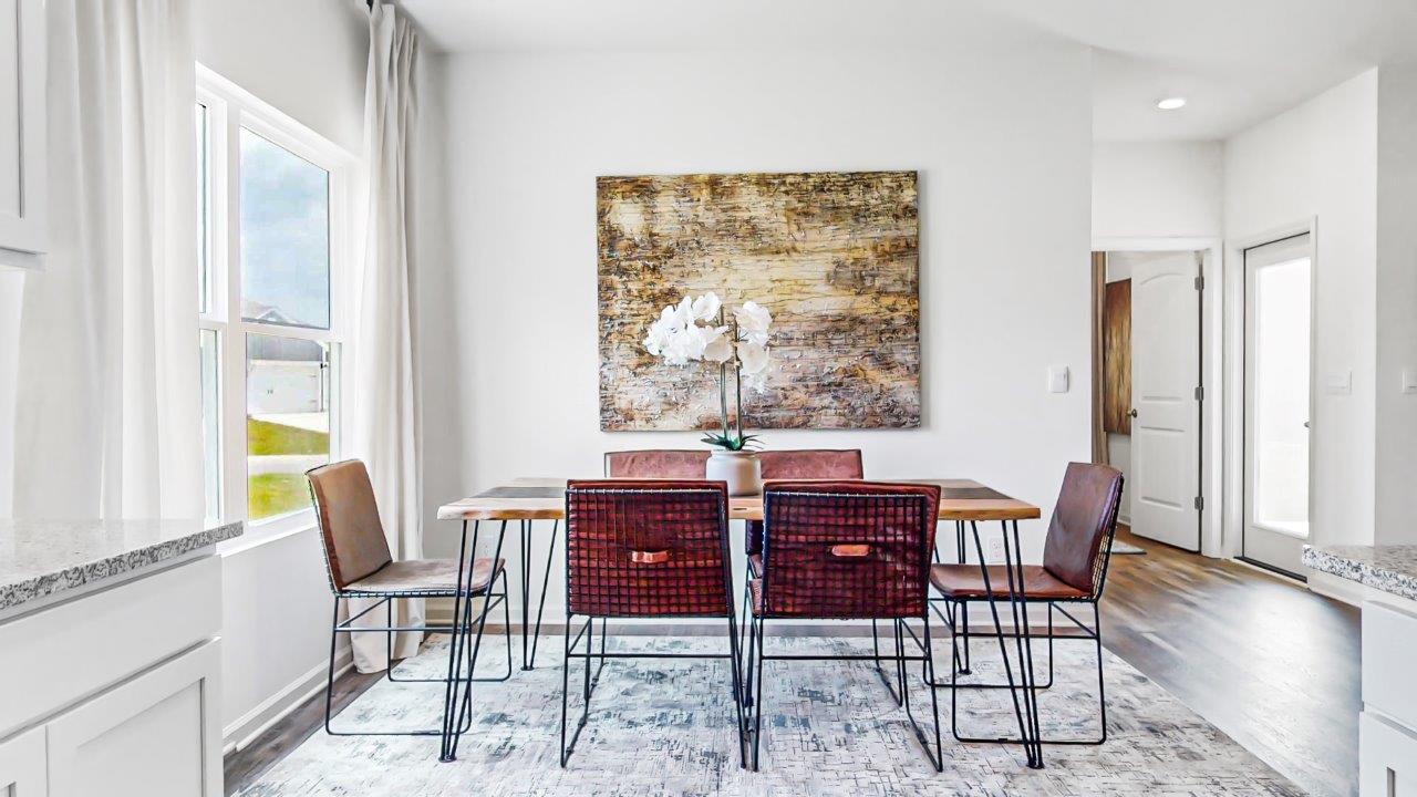 Breakfast nook with a full sized table can fit it the breakfast nook as well as six chairs