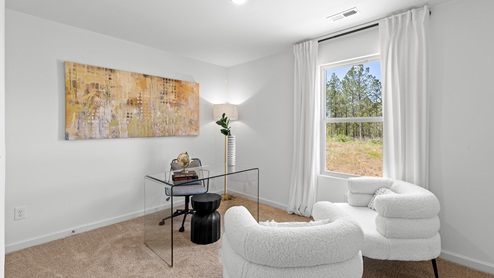 office lounge with white chairs and a glass desk