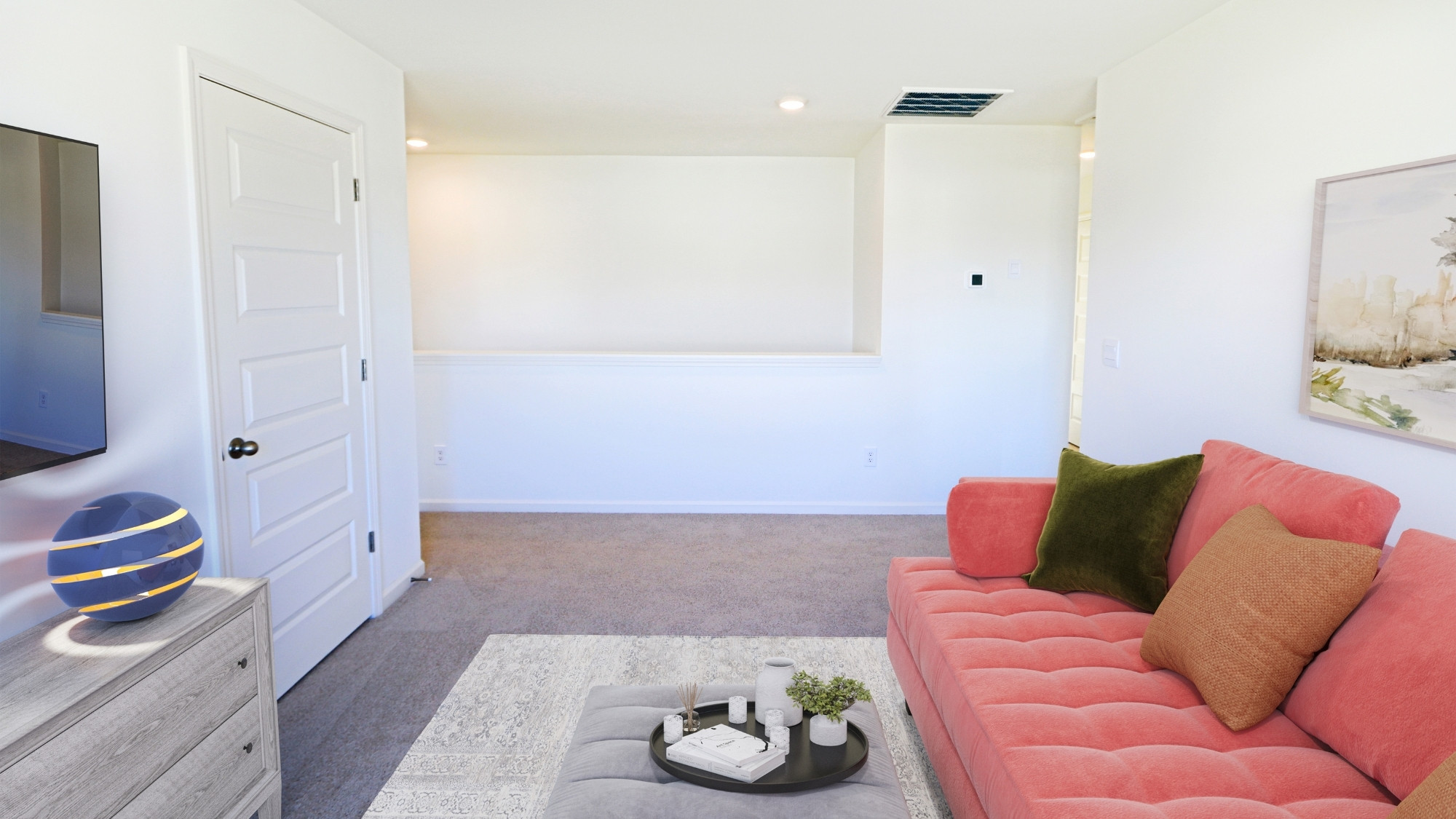 Here the loft area is staged as an upstairs media room.