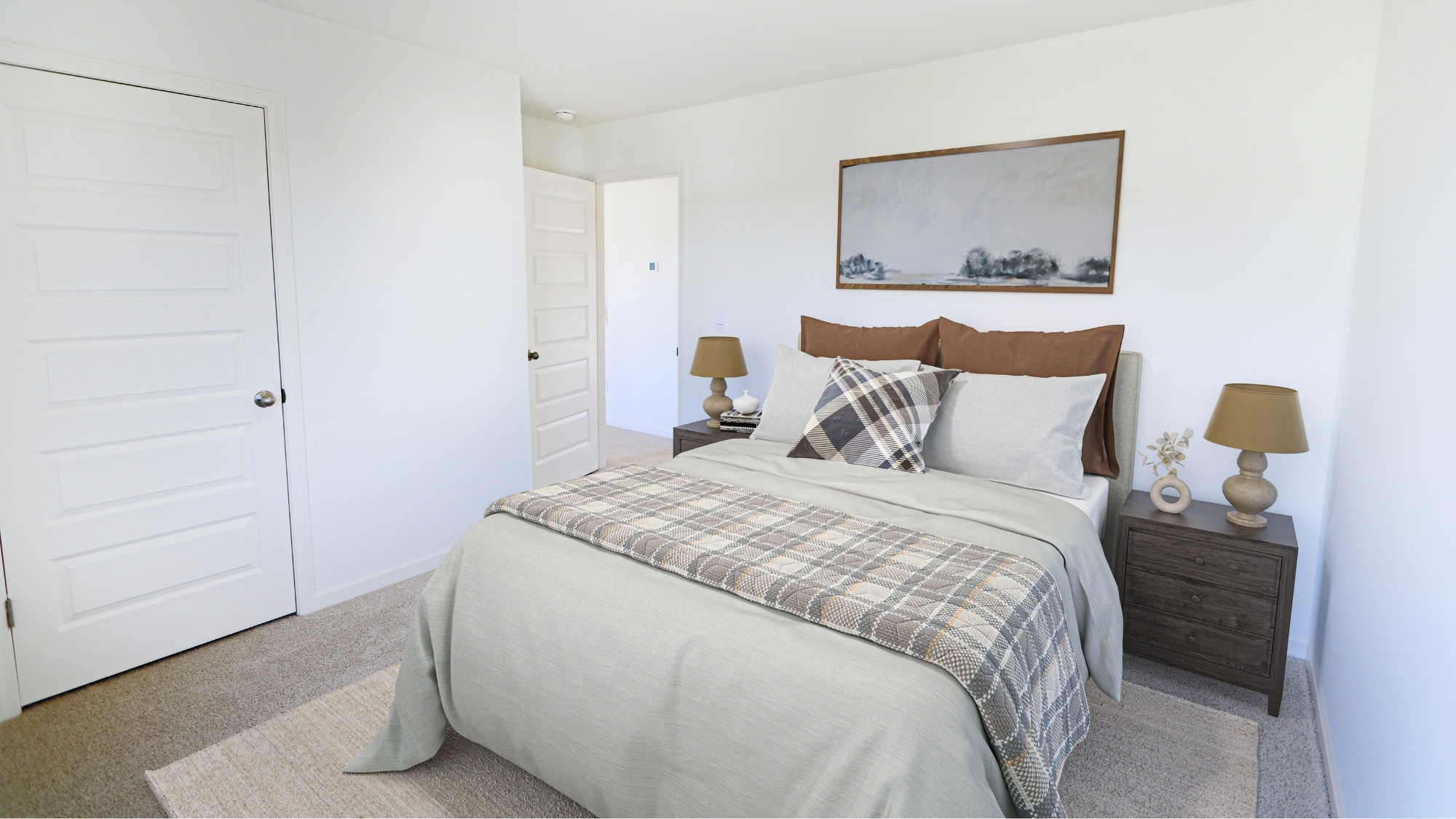 The third bedroom has ample space for a queen bed and two nighstands.