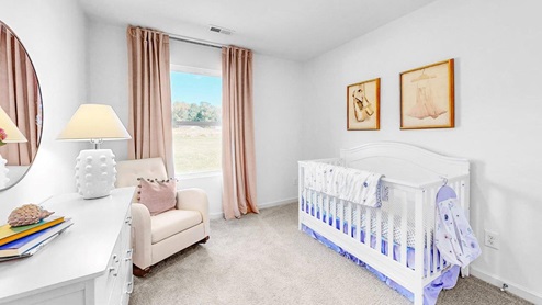 The second bedroom is equipped with two twin beds and a nightstand for convenience.