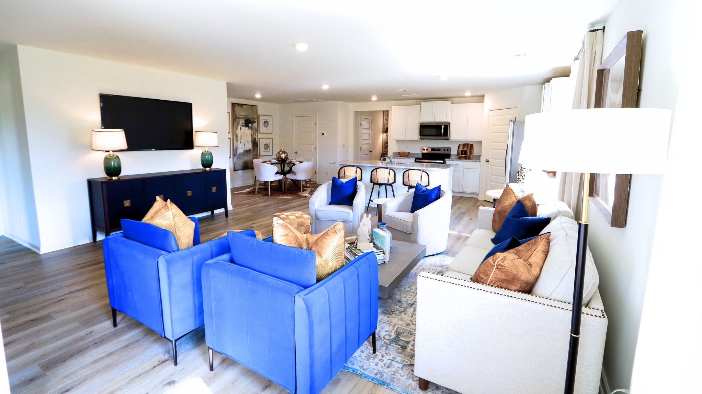 The Lakeside floor plan features a luxurious 5-bedroom, 3-bathroom residence with a two-car garage and exquisite details. The kitchen showcases a stunning design with quartz countertops, an undermount sink, a spacious island bar, top-of-the-line stainless-steel appliances, and a convenient corner pantry. This kitchen is seamlessly connected to the family room, making it perfect for hosting gatherings and spending quality time with loved ones. Adjacent to the kitchen, there is a delightful breakfast nook and a separate dining area. The home is filled with abundant natural light, creating a serene and inviting atmosphere. Stepping outside onto the expansive porch that leads to the backyard enhances the relaxing ambiance. Bedroom 1 offers ample space and comes with an adjoining bath featuring a double vanity, a generous sized shower, and a walk-in closet. The home is crafted with superior materials and workmanship, showcasing meticulous attention to detail, and is backed by a one-year builder's warranty.    Your new home comes complete with state-of-the-art smart home technology. This user-friendly package is designed to make it incredibly easy for you to control essential features with just a simple touch, offering you both convenience and modernity. The package comprises a variety of convenient features, including lighting automation, an IQ panel, a video doorbell, keyless front door entry, and the ability to manage temperature settings directly from your smartphone. Give us a call and take the first step in making the Lakeside your new home today!