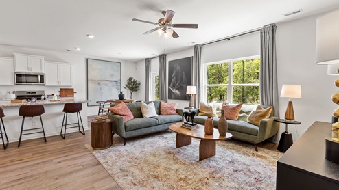 The open concept Carol floorplan allows for all of the spaces of your home to flow seamlessly together.