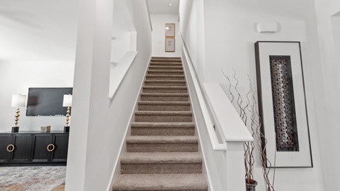 View of the staircase heading to the second floor