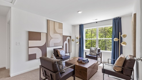The living room has space for a full set of living room furniture.
