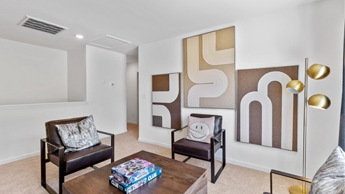The living room has space for a full set of living room furniture.