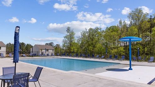 A unique 100-foot-tall clock tower stands watch over the grand entrance to Chelsea Park by D.R. Horton, the premiere community in Chelsea, Alabama. Conveniently located to Chelsea Community Center including activities for every age. Nearby residents can enjoy the community splashpad, archery range, and a host of youth sports complexes. Situated minutes from highway 280, this new home community provides easy access to Chelsea, Greystone’s conveniences, nearby dining options, and excellent recreation spots throughout the region. Go Chelsea Hornets! With home plans ranging in size from 1,613 square feet up to 2,511 square feet, Chelsea Park offers a variety of home plans including one level ranchers to a spacious two story. Each home in Chelsea Park is uniquely designed with modern living in mind, featuring granite countertops, elegant and durable flooring, and stainless-steel appliances. The easy-to-use Smart Home Technology Package included in every home provides the ultimate convenience, allowing you to control key features with the touch of a button. Featured conveniences include lighting automation, IQ panel, video doorbell, keyless front door entry, and temperature control from the ease of your phone. Whether you are looking for a spacious open floor plan or a more intimate design, Chelsea Park has a variety of options to suit your individual needs. For the outdoor enthusiasts, Chelsea Park’s location is perfect for accessing spots for hiking and biking adventures. In addition, state-of-the-art local parks and recreational opportunities are just minutes away, offering something for everyone. Chelsea, Alabama has been consistently voted as one of the “Best Places to Live in Alabama.” Come tour Chelsea Park today and join this vibrant community.