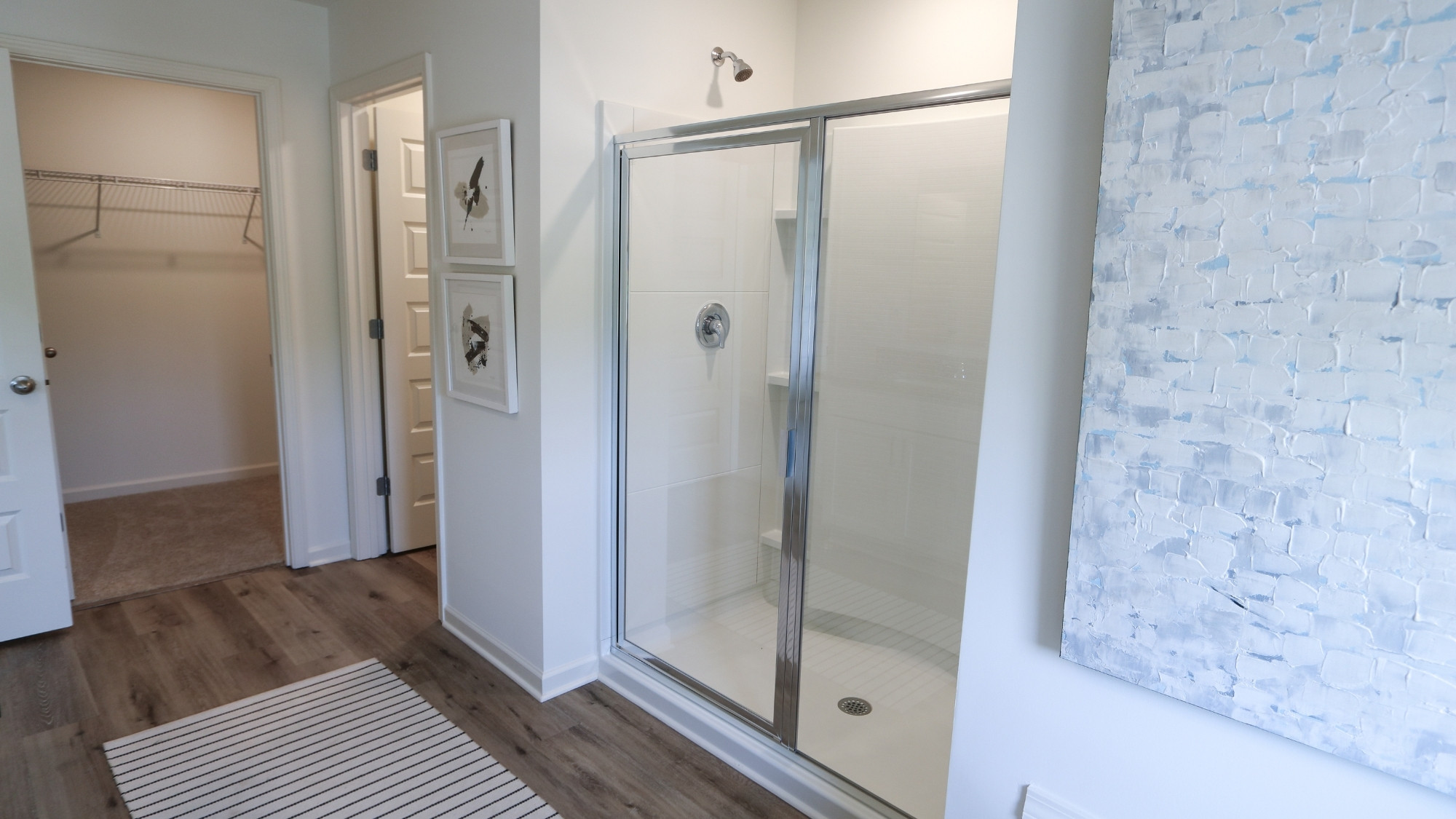 Off of the primary bathroom is a spacious walk-in closet.