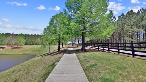 A unique 100-foot-tall clock tower stands watch over the grand entrance to Chelsea Park by D.R. Horton, the premiere community in Chelsea, Alabama. Conveniently located to Chelsea Community Center including activities for every age. Nearby residents can enjoy the community splashpad, archery range, and a host of youth sports complexes. Situated minutes from highway 280, this new home community provides easy access to Chelsea, Greystone’s conveniences, nearby dining options, and excellent recreation spots throughout the region. Go Chelsea Hornets! With home plans ranging in size from 1,613 square feet up to 2,511 square feet, Chelsea Park offers a variety of home plans including one level ranchers to a spacious two story. Each home in Chelsea Park is uniquely designed with modern living in mind, featuring granite countertops, elegant and durable flooring, and stainless-steel appliances. The easy-to-use Smart Home Technology Package included in every home provides the ultimate convenience, allowing you to control key features with the touch of a button. Featured conveniences include lighting automation, IQ panel, video doorbell, keyless front door entry, and temperature control from the ease of your phone. Whether you are looking for a spacious open floor plan or a more intimate design, Chelsea Park has a variety of options to suit your individual needs. For the outdoor enthusiasts, Chelsea Park’s location is perfect for accessing spots for hiking and biking adventures. In addition, state-of-the-art local parks and recreational opportunities are just minutes away, offering something for everyone. Chelsea, Alabama has been consistently voted as one of the “Best Places to Live in Alabama.” Come tour Chelsea Park today and join this vibrant community.