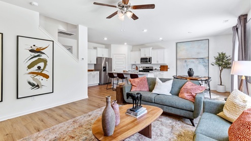 The open concept Carol floorplan allows for all of the spaces of your home to flow seamlessly together.