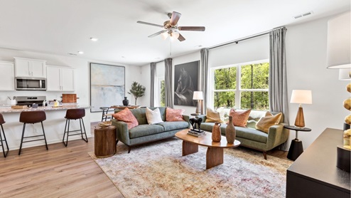 The open concept Carol floorplan allows for all of the spaces of your home to flow seamlessly together.
