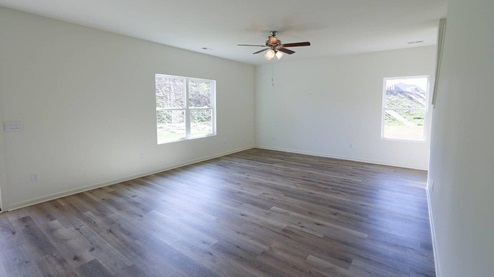 Spacious living area with modern design, perfect for creating your dream home. LIVING_2- Bright and spacious living room with large windows, perfect for creating a cozy home atmosphere.