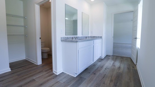Bright and spacious bathroom featuring double sinks and modern fixtures, perfect for a stylish home upgrade. MASTERBATH_2- Bright and modern bathroom featuring a spacious walk-in shower and soaking tub, perfect for relaxation and comfort. MASTERBATH_3- Spacious and clean bathroom featuring modern fixtures and handy storage options. MASTERBATH- Relax in this spacious, modern bathtub featuring sleek design and easy access to natural light. MASTERBATH_5- Modern shower design with clear glass doors and minimalist storage, perfect for a stylish bathroom update. MASTERBATH_6- Beautiful double sink vanity with granite countertop and mirrors, perfect for modern bathroom designs. MASTERBATH_7- Bright and spacious bathroom featuring elegant granite countertops and modern finishes for a stylish home upgrade.