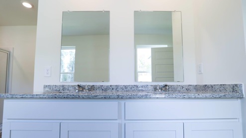 Bright and spacious bathroom featuring double sinks and modern fixtures, perfect for a stylish home upgrade. MASTERBATH_2- Bright and modern bathroom featuring a spacious walk-in shower and soaking tub, perfect for relaxation and comfort. MASTERBATH_3- Spacious and clean bathroom featuring modern fixtures and handy storage options. MASTERBATH- Relax in this spacious, modern bathtub featuring sleek design and easy access to natural light. MASTERBATH_5- Modern shower design with clear glass doors and minimalist storage, perfect for a stylish bathroom update. MASTERBATH_6- Beautiful double sink vanity with granite countertop and mirrors, perfect for modern bathroom designs. MASTERBATH_7- Bright and spacious bathroom featuring elegant granite countertops and modern finishes for a stylish home upgrade.