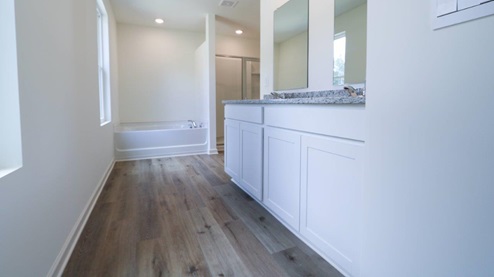 Bright and spacious bathroom featuring double sinks and modern fixtures, perfect for a stylish home upgrade. MASTERBATH_2- Bright and modern bathroom featuring a spacious walk-in shower and soaking tub, perfect for relaxation and comfort. MASTERBATH_3- Spacious and clean bathroom featuring modern fixtures and handy storage options. MASTERBATH- Relax in this spacious, modern bathtub featuring sleek design and easy access to natural light. MASTERBATH_5- Modern shower design with clear glass doors and minimalist storage, perfect for a stylish bathroom update. MASTERBATH_6- Beautiful double sink vanity with granite countertop and mirrors, perfect for modern bathroom designs. MASTERBATH_7- Bright and spacious bathroom featuring elegant granite countertops and modern finishes for a stylish home upgrade.