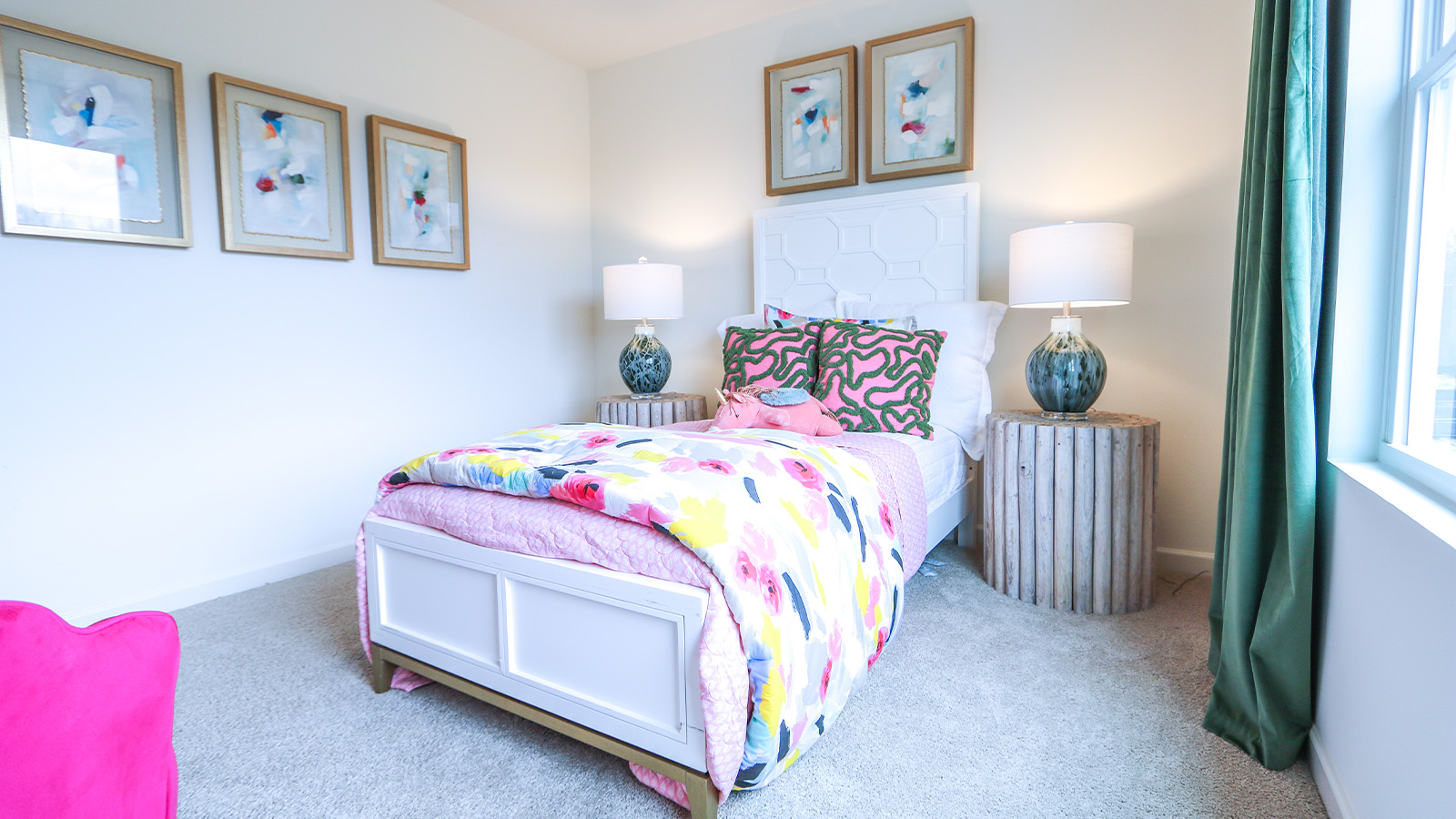 The second bedroom is equipped with two twin beds and a nightstand for convenience.