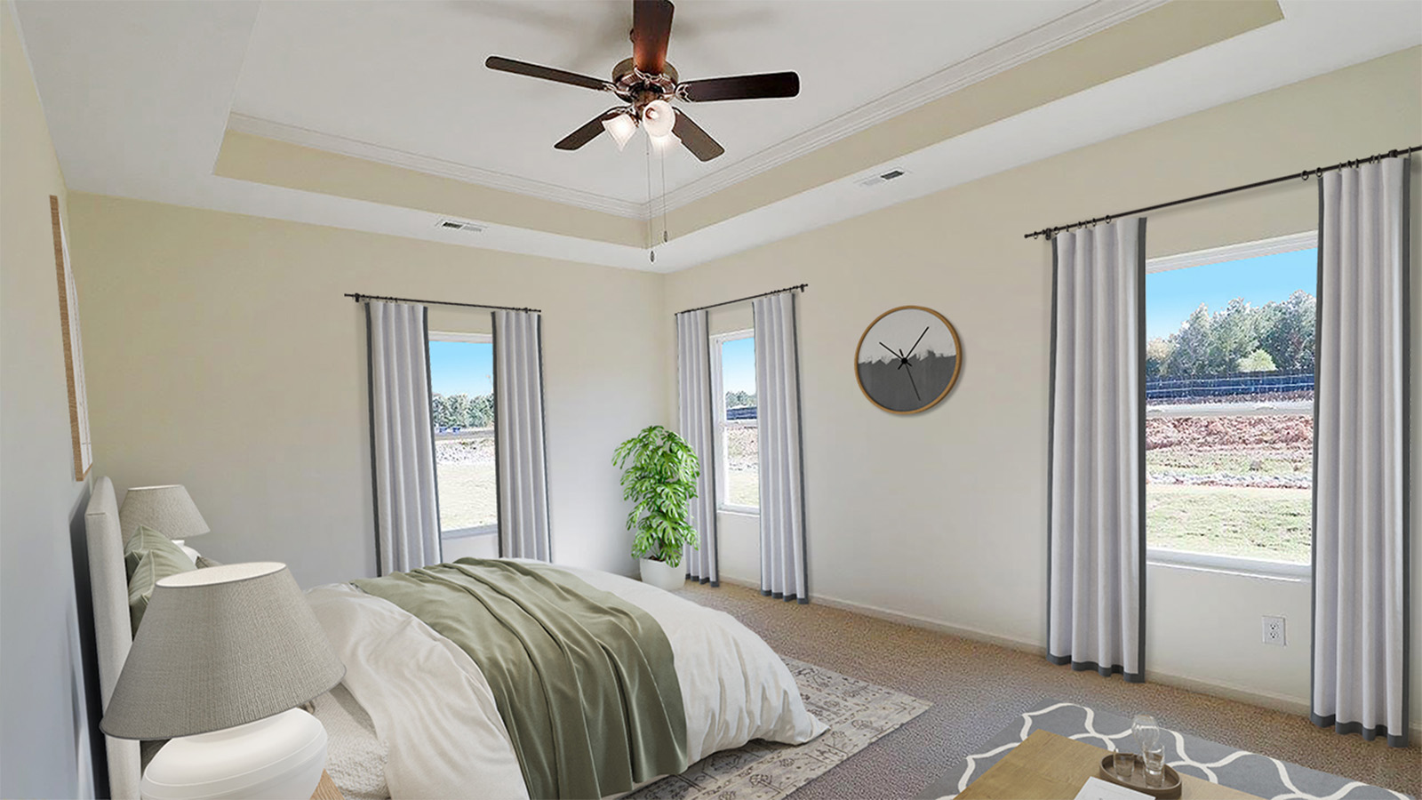 The primary bedroom has a lot of windows, to allow for lots of natural light to stream in during the day.