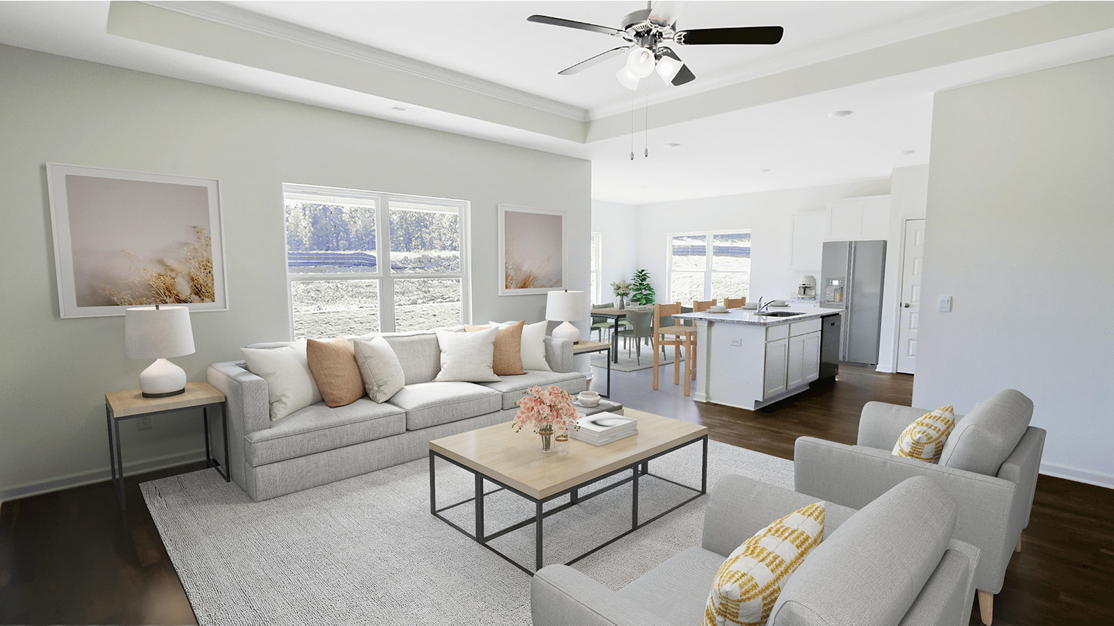 The large living room has space for basically any size couch, a large coffee table, and two large armchairs.