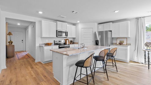 Visit Magnolia Hills by D.R. Horton, one of our premiere new home communities in Northport, Alabama! Magnolia Hills is conveniently tucked away off McFarland Boulevard, ensuring you quick access to all the fine dining, shopping, and entertainment that Tuscaloosa, Alabama has to offer. So, Tuscaloosa has it all from scenic parks, lakes and rivers to even a unique college football gameday experience like no other. This ideally located community features home plans up to 2,012 square feet up to larger plans with 2,511 square feet, with elegant kitchens, stylish and durable flooring. Some of the features include granite countertops, elegant and durable flooring, stainless steel appliances, and our smart home technology package. The easy-to-use Smart Home Technology Package included in every home provides the ultimate convenience, allowing you to control key features with the touch of a button. Featured conveniences include lighting automation, IQ panel, video doorbell, keyless front door entry, and temperature control from the ease of your phone. Home to the University of Alabama, Tuscaloosa is a bustling city of innovation and economic growth, featuring a lively downtown district, the largest outdoor amphitheater in West Alabama, the River Market, and the Gateway Innovation and Discovery Center. Tuscaloosa is perfect for outdoor-inspired lifestyles, with its winding two-mile path along the Black Warrior River, and almost 2,000 acres of green space including over 35 parks, boat landings, six activity centers, and an 18-hole award winning golf course. And you’re just minutes from boating, fishing or just relaxing on Lake Tuscaloosa. These homes will sell quickly, so tour Magnolia Hills today!