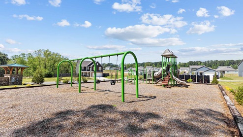 Visit Magnolia Hills by D.R. Horton, one of our premiere new home communities in Northport, Alabama! Magnolia Hills is conveniently tucked away off McFarland Boulevard, ensuring you quick access to all the fine dining, shopping, and entertainment that Tuscaloosa, Alabama has to offer. So, Tuscaloosa has it all from scenic parks, lakes and rivers to even a unique college football gameday experience like no other. This ideally located community features home plans up to 2,012 square feet up to larger plans with 2,511 square feet, with elegant kitchens, stylish and durable flooring. Some of the features include granite countertops, elegant and durable flooring, stainless steel appliances, and our smart home technology package. The easy-to-use Smart Home Technology Package included in every home provides the ultimate convenience, allowing you to control key features with the touch of a button. Featured conveniences include lighting automation, IQ panel, video doorbell, keyless front door entry, and temperature control from the ease of your phone. Home to the University of Alabama, Tuscaloosa is a bustling city of innovation and economic growth, featuring a lively downtown district, the largest outdoor amphitheater in West Alabama, the River Market, and the Gateway Innovation and Discovery Center. Tuscaloosa is perfect for outdoor-inspired lifestyles, with its winding two-mile path along the Black Warrior River, and almost 2,000 acres of green space including over 35 parks, boat landings, six activity centers, and an 18-hole award winning golf course. And you’re just minutes from boating, fishing or just relaxing on Lake Tuscaloosa. These homes will sell quickly, so tour Magnolia Hills today!