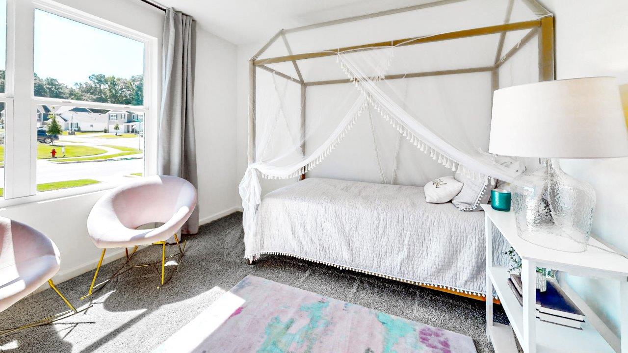 Third bedroom features a bed with 2 nightstand and a dresser.