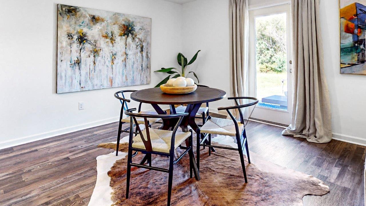 Open concept dining room that opens to the kitchen and the living room