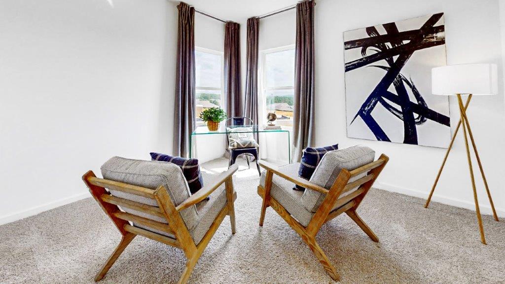 Bedroom is off the living room that is currently used as an office complete with desk and 2 guest chairs