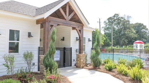 Welcome to Wright Farms, a stunning new community of homes nestled in the heart of Springville, Alabama. Known for its rich history and charming small-town atmosphere, Springville offers the perfect blend of modern living and historic charm. The towns federally registered downtown historic district features unique dining experiences, local boutiques, and entertainment options that cater to all ages. Wright Farms comes with amenities such as a community pool for your enjoyment. With home plans ranging in size from 1,497 square feet up to 2,511 square feet, Wright Farms offers a variety of home plans including one level ranchers to a spacious two story. Each home in Wright Farms is uniquely designed with modern living in mind, featuring granite countertops, elegant and durable flooring, and stainless-steel appliances. The easy-to-use Smart Home Technology Package included in every home provides the ultimate convenience, allowing you to control key features with the touch of a button. Featured conveniences include lighting automation, IQ panel, video doorbell, keyless front door entry, and temperature control from the ease of your phone. Springville is surrounded by natural beauty, with parks, hiking trails, and outdoor recreational areas just a short drive away. Wright Farms offers a range of modern home designs, perfect for families, professionals, and retirees alike. Springville is home to a well-regarded school system that serves the needs of families in the community. The schools in Springville are part of the St. Clair County School District, which is known for its commitment to academic excellence and student development. Some of the schools include Springville Elementary School, Springville Middle School, and Springville High School. Come discover Wright Farms and make Springville, Alabama, your community today!