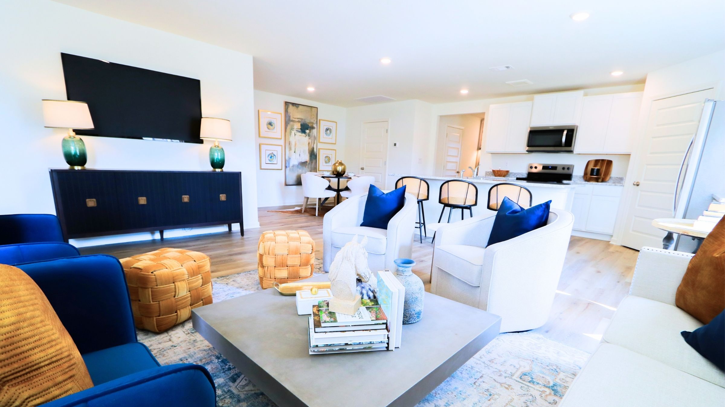 The Lakeside floor plan features a luxurious 5-bedroom, 3-bathroom residence with a two-car garage and exquisite details. The kitchen showcases a stunning design with quartz countertops, an undermount sink, a spacious island bar, top-of-the-line stainless-steel appliances, and a convenient corner pantry. This kitchen is seamlessly connected to the family room, making it perfect for hosting gatherings and spending quality time with loved ones. Adjacent to the kitchen, there is a delightful breakfast nook and a separate dining area. The home is filled with abundant natural light, creating a serene and inviting atmosphere. Stepping outside onto the expansive porch that leads to the backyard enhances the relaxing ambiance. Bedroom 1 offers ample space and comes with an adjoining bath featuring a double vanity, a generous sized shower, and a walk-in closet. The home is crafted with superior materials and workmanship, showcasing meticulous attention to detail, and is backed by a one-year builder's warranty.