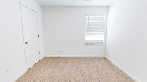Lakeside – Bedroom 4 – fourth bedroom that shows a window, carpet and door to the closet
