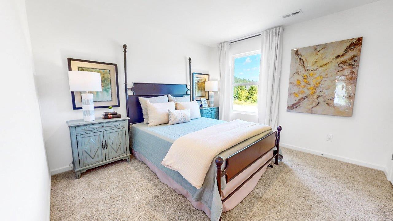 Guest bedroom with bed