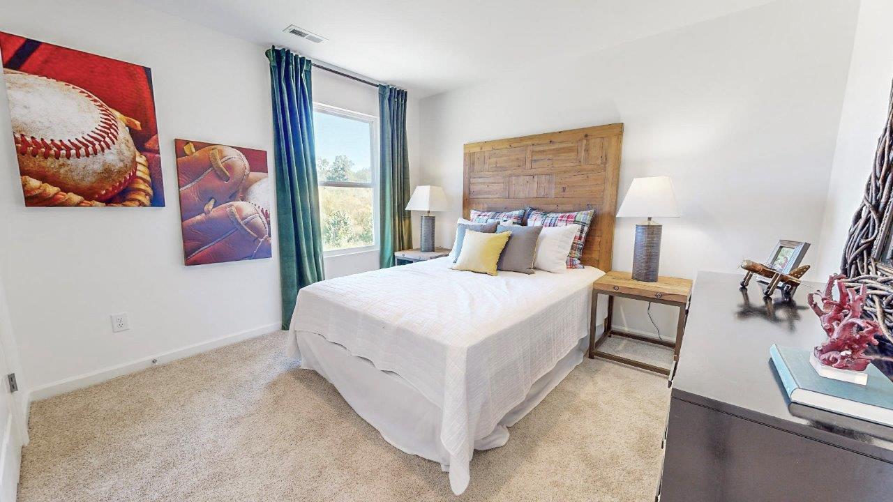 Second guest bedroom with bed