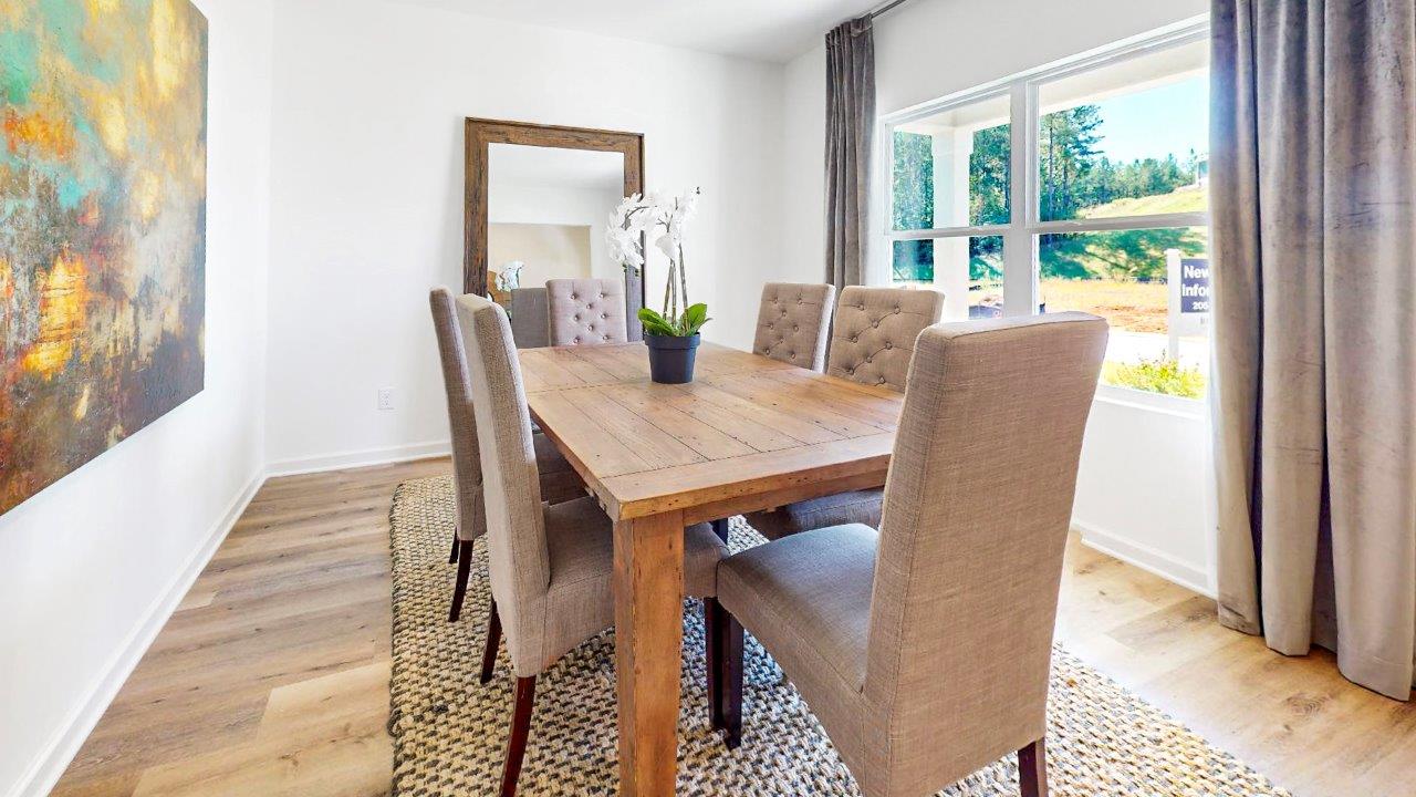 Formal Dining room with a large dinner table and 6 chairs