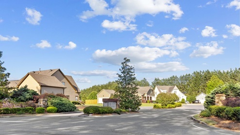 Conveniently located near I-459 in McCalla, Alabama, Rosser Farms by D.R. Horton offers the perfect blend of convenience and comfort. Nestled near diverse restaurants, shopping centers, and the Bent Brook Golf Course, this neighborhood has something for everyone. Adventure seekers will love the nearby K1 Speed indoor go-kart arena, while outdoor enthusiasts can enjoy various recreational activities. With easy access to Hoover, Rosser Farms provides an ideal setting for those looking to enjoy both vibrant city life and peaceful suburban living. Go Mcadory Yellowjackets! With home plans ranging in size from 1,618 square feet up to 2,511 square feet, Rosser Farms offers a variety of home plans including one level ranchers to a spacious two story. Each home in Rosser Farms is uniquely designed with modern living in mind, featuring granite countertops, elegant and durable flooring, and stainless-steel appliances. The easy-to-use Smart Home Technology Package included in every home provides the ultimate convenience, allowing you to control key features with the touch of a button. Featured conveniences include lighting automation, IQ panel, video doorbell, keyless front door entry, and temperature control from the ease of your phone. Whether you are looking for a spacious open floor plan or a more intimate design, Rosser Farms has a variety of options to suit your individual needs. For the outdoor enthusiasts, Rosser Farm’s location is perfect for accessing spots for hiking at Tannehill state park and biking adventures. In addition, state-of-the-art local parks and recreational opportunities are just minutes away, offering something for everyone. Take a personal tour of Rosser Farms today and discover how this beautiful new home community near McCalla, Alabama, can perfectly match your lifestyle. Come explore Rosser Farms and discover your new home today!