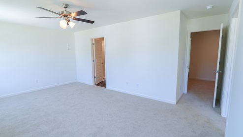 The spacious primary bedroom in the Ryan floorplan.