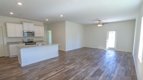 With large windows and a well- planned lighting layout, the whole space fills with light no matter the time of day.