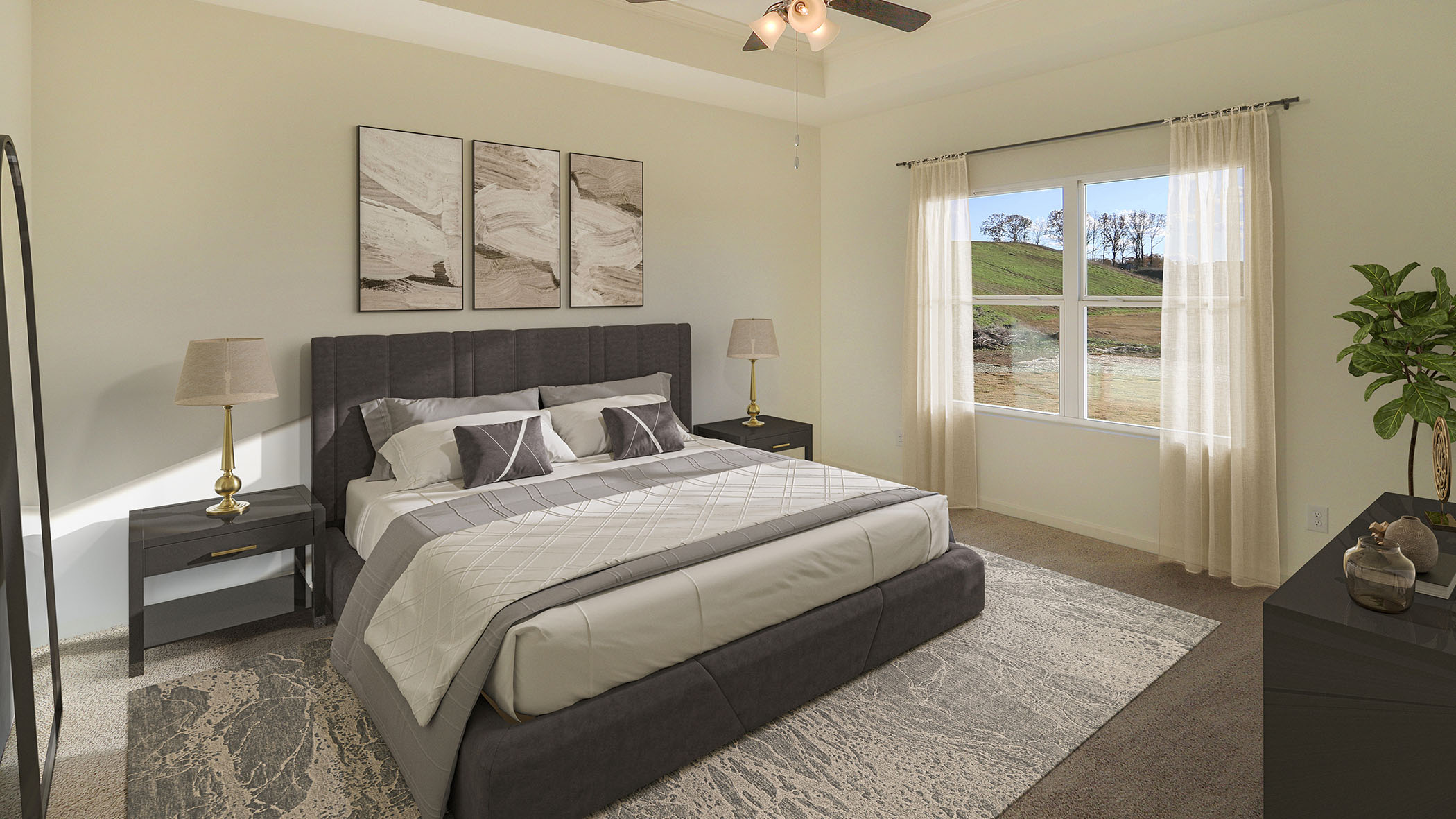 A cozy bedroom featuring a ceiling fan above a neatly made bed, creating a comfortable and inviting atmosphere.