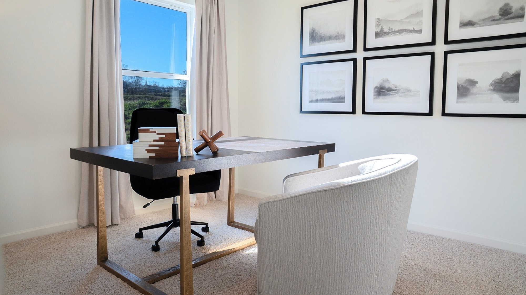 The fifth bedroom is shown here staged as a home office, with ample room for a large desk and 2 meeting chairs.