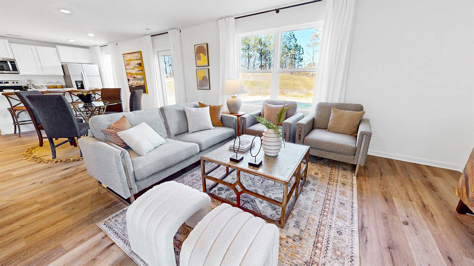 Imagine a warm and inviting living room filled with comfortable couches and a stylish coffee table.