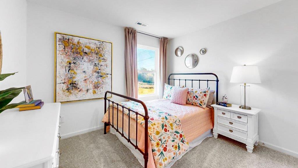 11. Cali – primary bathroom closet – the primary bedroom walk in closet is located in the back of the bathroom with ample space for clothes