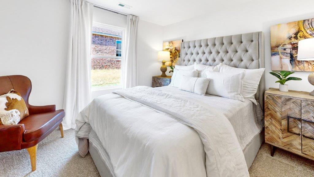 5. Cali – Dining Room – an open concept dining room that features a large dining table, and a breakfast consol that opens to the oversized kitchen