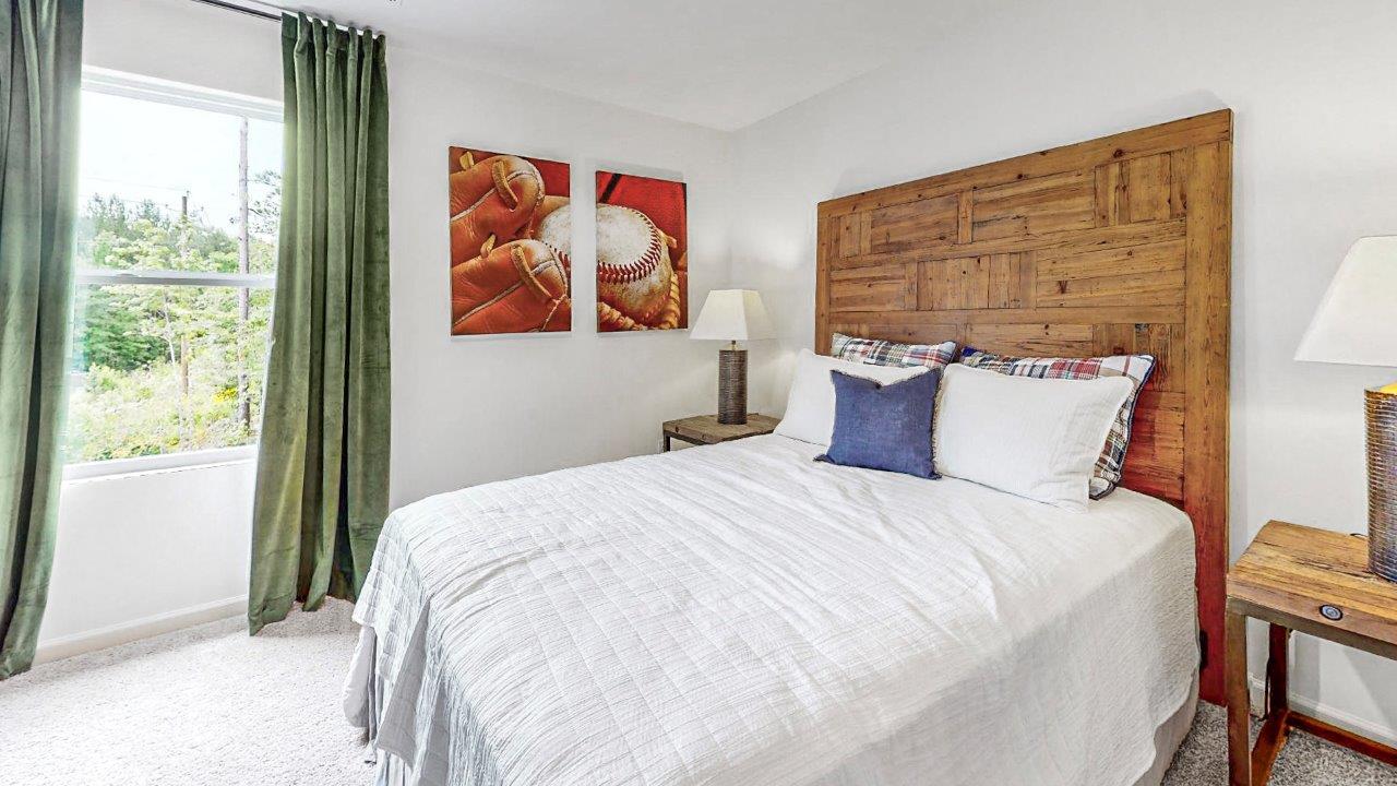 Elston – Bedroom 4 – a fourth bedroom that shows a bed and two nightstands