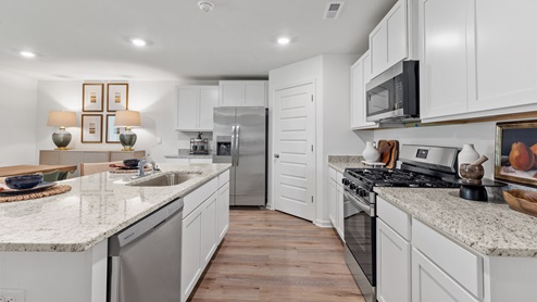 Find your ideal home at Oak Village by D.R. Horton, one of our new home communities in Pell City, Alabama! Pell City is a thriving city with a rich history settled in the heart of St. Clair County. While offering small-town southern charm, Oak Village is also a growing community with access to some of Alabama's finest lakes such as Logan Martin Lake; all while offering convenient access to major highways. This prime location allows for easy commutes while still enjoying the tranquility of suburban living. Featuring spacious home plans starting at 1,613 square feet and going up to 2,164 square feet, Oak Village offers a variety of home plans ranging from a single level open floor plan to a spacious two story. Each home in Oak Village is uniquely designed with modern living in mind featuring granite countertops, elegant and durable flooring, and stainless-steel appliances. The easy-to-use Smart Home Technology Package included in every home provides the ultimate convenience, allowing you to control key features with the touch of a button. Featured conveniences include lighting automation, IQ panel, video doorbell, keyless front door entry, and temperature control from the ease of your phone. Pell City, founded by Railroad investors in the late 1800's, features a blend of historical heritage, modern shops, movie theatres, local restaurants, and a growing population, all blending together to ensure Pell City is the perfect place for you. Enjoy fishing? Take a trip to the Lakeside Park or a boat down the Coosa River to get the full Pell City experience. With quick access to the nearby conveniences of Pell City, Oak Village balances small town life and the convenience of local shopping and dining. Both the Talladega Super Speedway and the Barber Motorsports Museum, which offers tours and fieldtrips, are just a short drive away. Pell City is also a prime location for personal travel, conveniently located minutes off I-59, and only two hours to either Atlanta or Huntsville. Explore new homes in Pell City, AL. Oak Village is the place to be, so don't wait and book your tour today!