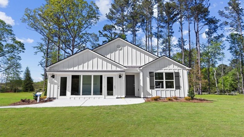 Find your ideal home at Oak Village by D.R. Horton, one of our new home communities in Pell City, Alabama! Pell City is a thriving city with a rich history settled in the heart of St. Clair County. While offering small-town southern charm, Oak Village is also a growing community with access to some of Alabama's finest lakes such as Logan Martin Lake; all while offering convenient access to major highways. This prime location allows for easy commutes while still enjoying the tranquility of suburban living. Featuring spacious home plans starting at 1,613 square feet and going up to 2,164 square feet, Oak Village offers a variety of home plans ranging from a single level open floor plan to a spacious two story. Each home in Oak Village is uniquely designed with modern living in mind featuring granite countertops, elegant and durable flooring, and stainless-steel appliances. The easy-to-use Smart Home Technology Package included in every home provides the ultimate convenience, allowing you to control key features with the touch of a button. Featured conveniences include lighting automation, IQ panel, video doorbell, keyless front door entry, and temperature control from the ease of your phone. Pell City, founded by Railroad investors in the late 1800's, features a blend of historical heritage, modern shops, movie theatres, local restaurants, and a growing population, all blending together to ensure Pell City is the perfect place for you. Enjoy fishing? Take a trip to the Lakeside Park or a boat down the Coosa River to get the full Pell City experience. With quick access to the nearby conveniences of Pell City, Oak Village balances small town life and the convenience of local shopping and dining. Both the Talladega Super Speedway and the Barber Motorsports Museum, which offers tours and fieldtrips, are just a short drive away. Pell City is also a prime location for personal travel, conveniently located minutes off I-59, and only two hours to either Atlanta or Huntsville. Explore new homes in Pell City, AL. Oak Village is the place to be, so don't wait and book your tour today!