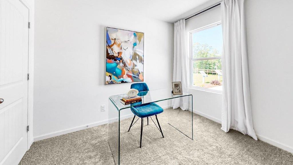 the fourth bedroom currently being used as an office has a oversized desk with ample space still in the room