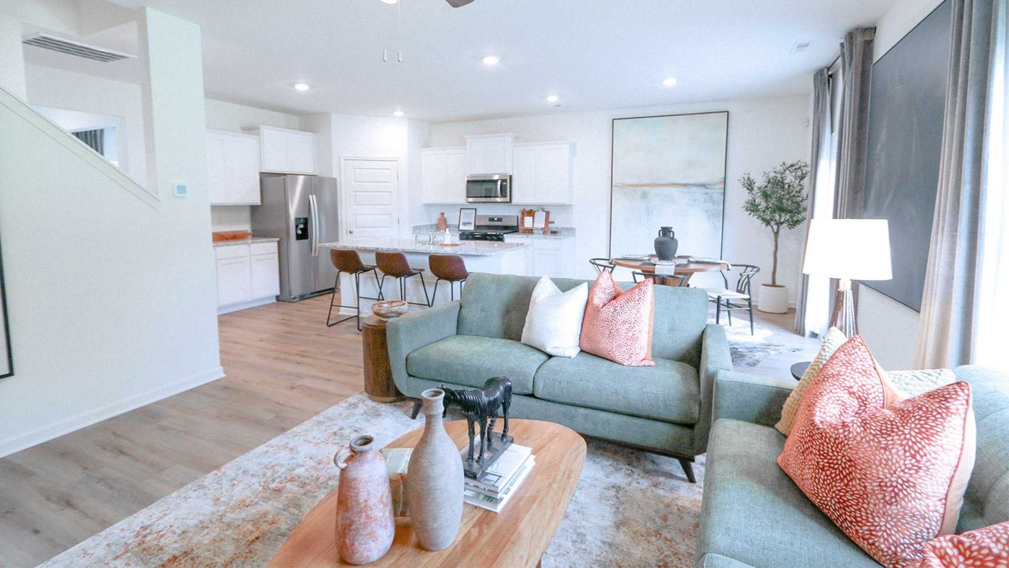 The living room has space for a full set of living room furniture.