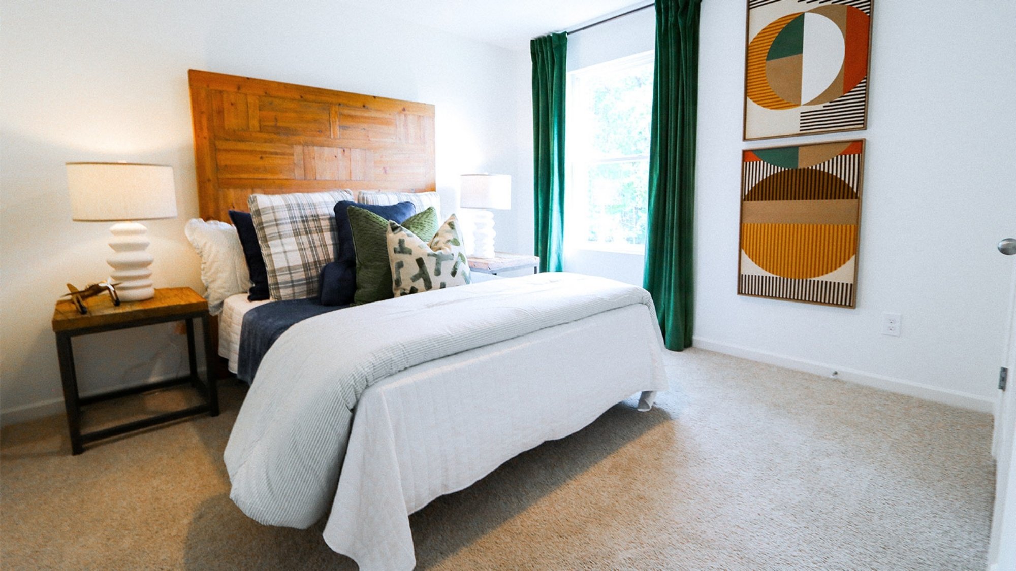 The main level features a spacious, full-sized bathroom equipped with a vanity, single sink, toilet, and a shower tub.