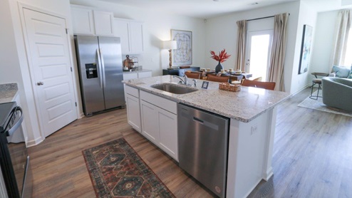 The Rhett plan is a well-designed single-level layout with 4 bedrooms and 2 bathrooms, encompassing 1,774 square feet for practical living. One standout feature of the Rhett plan is the seamless integration of the kitchen, breakfast area, and great room in an open concept layout, which is perfect for hosting guests. The kitchen is equipped with granite countertops, stainless steel appliances, and a pantry for added convenience and modern style. The spacious Living Area features trey ceilings and leads to a shaded covered patio, creating a welcoming space for relaxation and entertaining. Bedroom One suite offers a private retreat with trey ceilings, a luxurious shower, separate garden tub, double marble vanity, private water closet, and a large walk-in closet for added comfort and luxury. For convenience and storage, the plan includes a two-car garage and a laundry room. In addition to Bedroom One suite, there are 3 other bedrooms and another full bathroom, providing ample space for family and guests. Furthermore, the home comes with a one-year builder's warranty, ensuring peace of mind for the new homeowners. Furthermore, every home is accompanied by a one-year builder's warranty to provide you with added peace of mind. It's important to note that our smart home technology package is included as part of your new home. The Smart Home Technology Package we offer is designed for effortless use and provides unmatched convenience, allowing you to easily control various essential features with just a simple touch. Some of the features of this package include lighting automation, an IQ panel, a video doorbell, keyless front door entry, and the ability to manage the temperature from the comfort of your phone. Give us a call and schedule your personal guided tour of the Rhett today!