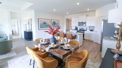 The Rhett plan is a well-designed single-level layout with 4 bedrooms and 2 bathrooms, encompassing 1,774 square feet for practical living. One standout feature of the Rhett plan is the seamless integration of the kitchen, breakfast area, and great room in an open concept layout, which is perfect for hosting guests. The kitchen is equipped with granite countertops, stainless steel appliances, and a pantry for added convenience and modern style. The spacious Living Area features trey ceilings and leads to a shaded covered patio, creating a welcoming space for relaxation and entertaining. Bedroom One suite offers a private retreat with trey ceilings, a luxurious shower, separate garden tub, double marble vanity, private water closet, and a large walk-in closet for added comfort and luxury. For convenience and storage, the plan includes a two-car garage and a laundry room. In addition to Bedroom One suite, there are 3 other bedrooms and another full bathroom, providing ample space for family and guests. Furthermore, the home comes with a one-year builder's warranty, ensuring peace of mind for the new homeowners. Furthermore, every home is accompanied by a one-year builder's warranty to provide you with added peace of mind. It's important to note that our smart home technology package is included as part of your new home. The Smart Home Technology Package we offer is designed for effortless use and provides unmatched convenience, allowing you to easily control various essential features with just a simple touch. Some of the features of this package include lighting automation, an IQ panel, a video doorbell, keyless front door entry, and the ability to manage the temperature from the comfort of your phone. Give us a call and schedule your personal guided tour of the Rhett today!